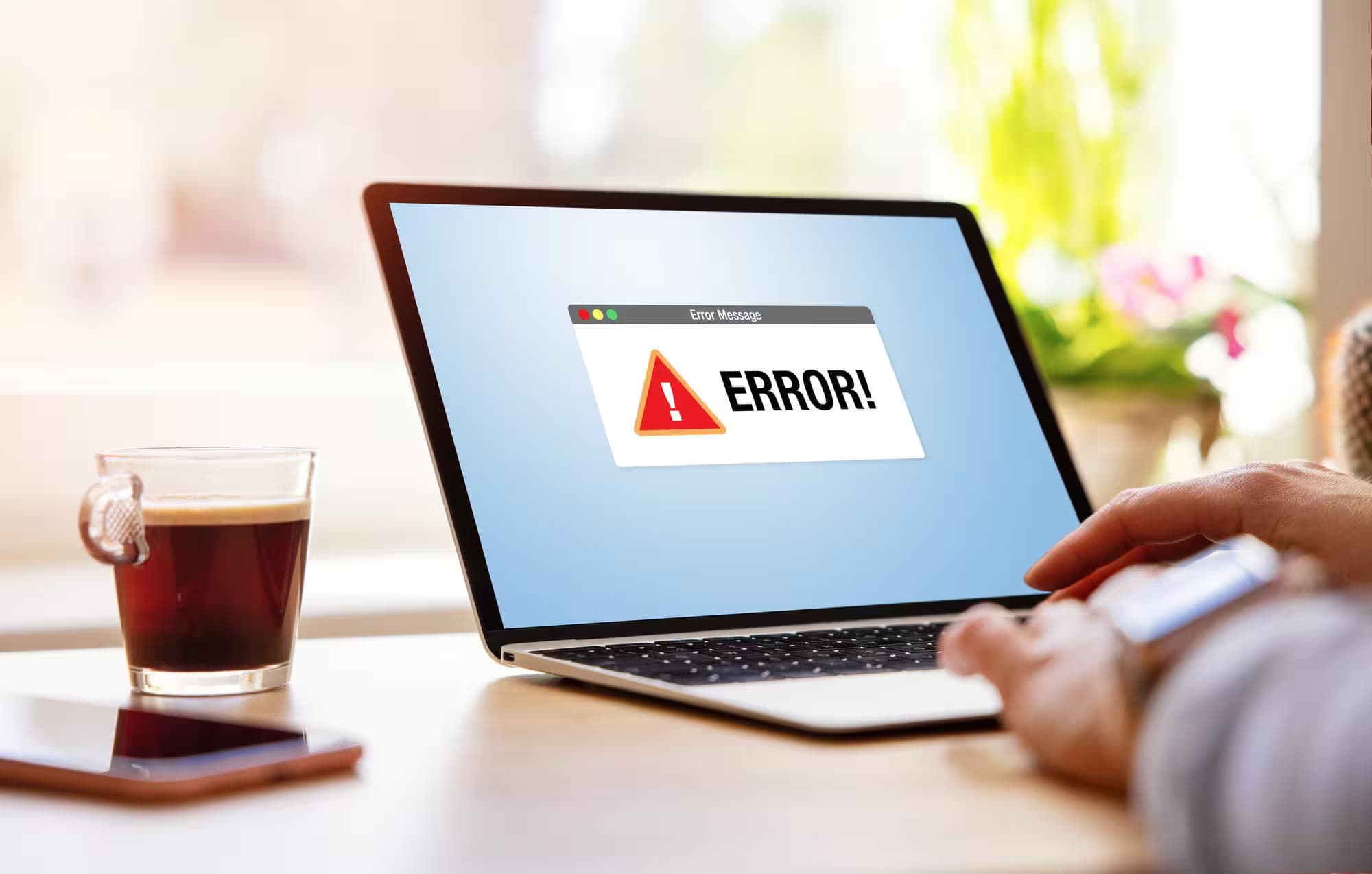 Laptop screen showing an error alert message