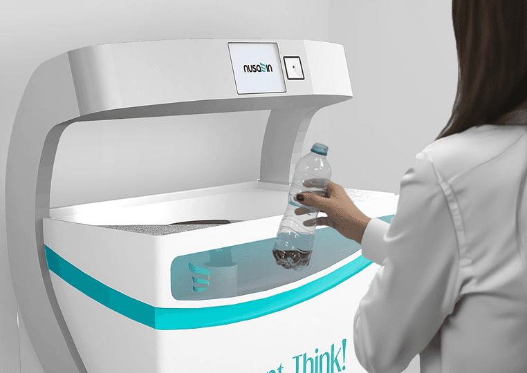 Woman disposing waste into Srikandi